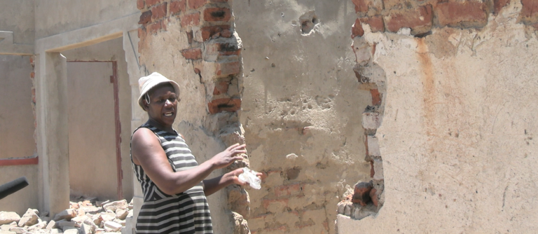 …villagers cry as they demolish own homes